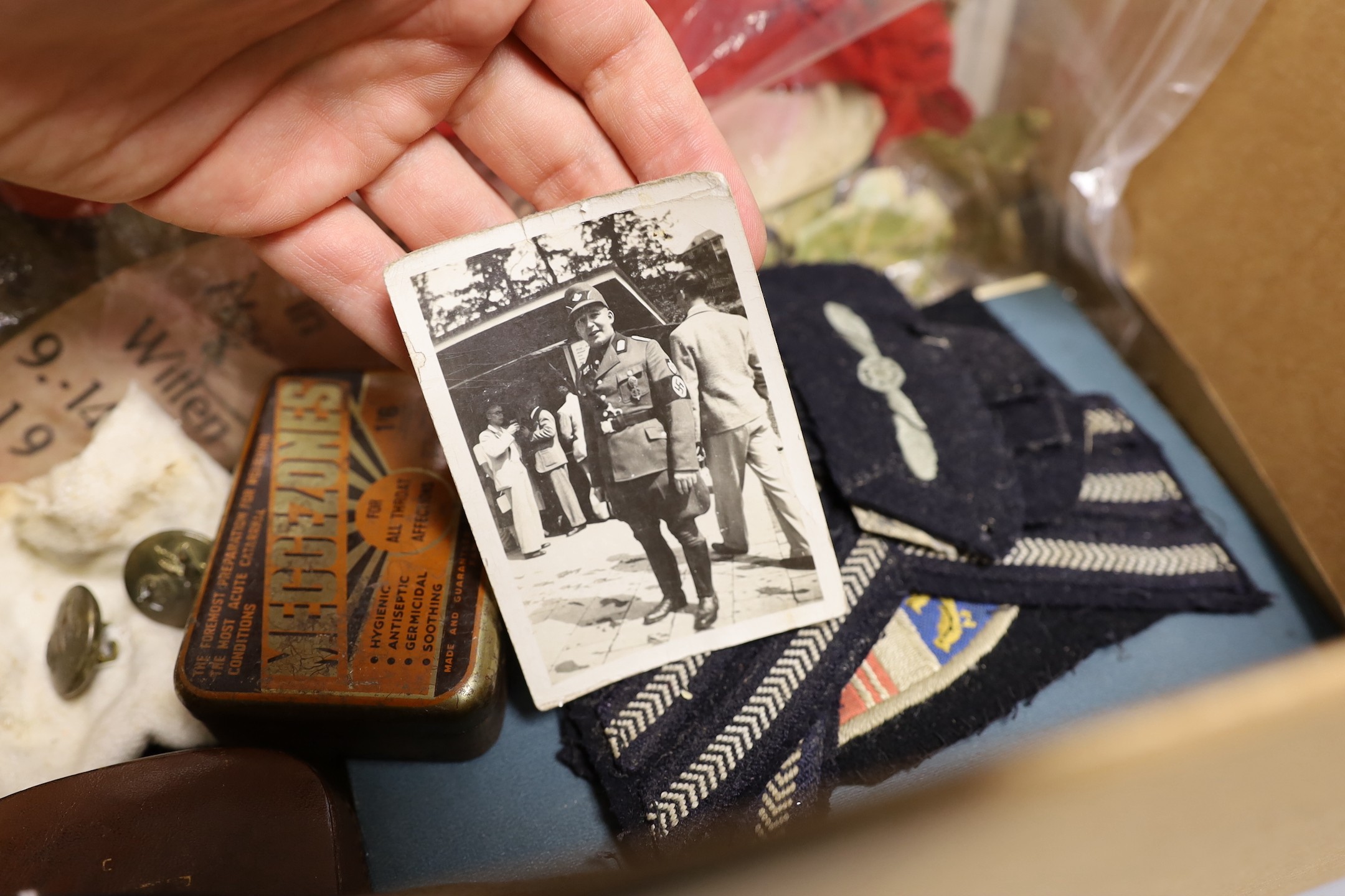 A Hitler youth knife, Observer's and Air Gunner's log-book, 1940, swimming material, all relating to George Eley, RAF